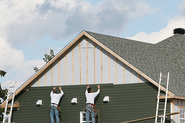 Professional Storm Damage Siding Repair technician working in Goldsboro, NC